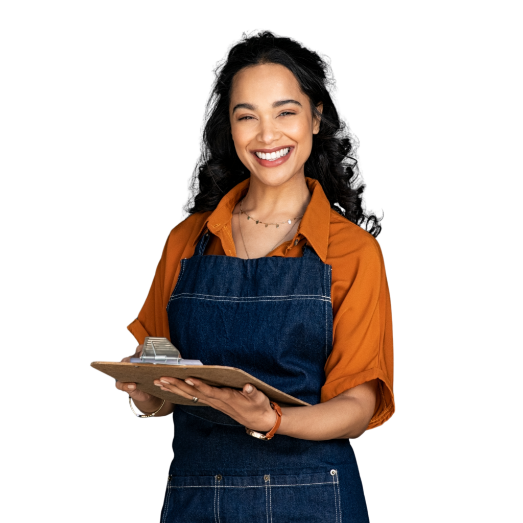 Woman business owner wearing apron and holding a clipboard